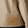 Chaqueta abotonada de algodón beige Chaqueta abotonada de algodón beige