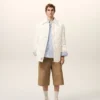 Chaqueta acolchada con botones de nailon blanco Chaqueta acolchada con botones de nailon blanco