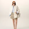 Chaqueta acolchada con botones de nailon blanco Chaqueta acolchada con botones de nailon blanco