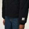 Chaqueta acolchada de nailon negro Chaqueta acolchada de nailon negro