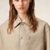 Chaqueta Ami de Coeur de nailon beige con botones de presión