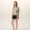 Chaqueta Ami de Coeur de nailon beige con botones de presión