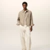 Chaqueta Ami de Coeur de nailon beige con botones de presión