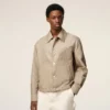 Chaqueta Ami de Coeur de nailon beige con botones de presión