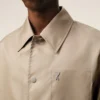 Chaqueta Ami de Coeur de nailon beige con botones de presión