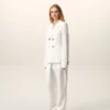 Chaqueta blanca de lino con doble botonadura Chaqueta blanca de lino con doble botonadura