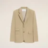 Chaqueta cuadrada de lana nueva en color beige con cierre de un solo botonero