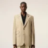 Chaqueta cuadrada de lana nueva en color beige con cierre de un solo botonero