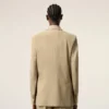 Chaqueta cuadrada de lana nueva en color beige con cierre de un solo botonero