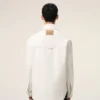 Chaqueta de trabajo de algodón blanco con botones Chaqueta de trabajo de algodón blanco con botones