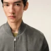 Chaqueta gris con cremallera de piel de cabra Ami de Coeur Chaqueta gris con cremallera de piel de cabra Ami de Coeur