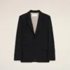 Chaqueta negra de lana nueva, de corte recto y botonadura simple Chaqueta negra de lana nueva, de corte recto y botonadura simple