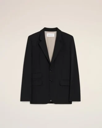 Chaqueta negra de lana nueva, de corte recto y botonadura simple