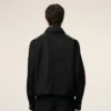 Chaqueta negra de nailon Ami de Coeur con botones de presión Chaqueta negra de nailon Ami de Coeur con botones de presión