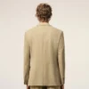 Chaqueta recta de lana nueva en color beige con cierre de un solo botonero Chaqueta recta de lana nueva en color beige con cierre de un solo botonero