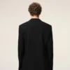 Chaqueta recta de lana virgen negra de un solo botonadura Chaqueta recta de lana virgen negra de un solo botonadura
