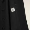 Chaqueta recta de lana virgen negra de un solo botonero Chaqueta recta de lana virgen negra de un solo botonero