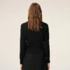 Cárdigan de cuello redondo de lana negra con «Ami de Coeur» en contraste Cárdigan de cuello redondo de lana negra con «Ami de Coeur» en contraste