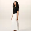 Falda larga trapecio de confección sartorial en mezcla de lino blanco Falda larga trapecio de confección sartorial en mezcla de lino blanco