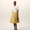 Falda midi Corolla de algodón amarillo Falda midi Corolla de algodón amarillo