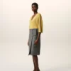 Falda midi de lana nueva gris con cinturón de hebilla grande Falda midi de lana nueva gris con cinturón de hebilla grande