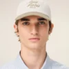 Gorra Ami Paris de algodón bicolor beige y blanco Gorra Ami Paris de algodón bicolor beige y blanco