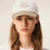 Gorra Ami Paris de algodón bicolor beige y blanco Gorra Ami Paris de algodón bicolor beige y blanco
