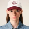 Gorra Ami Paris de algodón bicolor rojo y blanco Gorra Ami Paris de algodón bicolor rojo y blanco