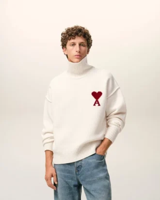 Jersey de cuello alto de lana natural con Ami de Coeur en contraste