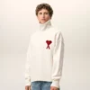 Jersey de cuello alto de lana natural con Ami de Coeur en contraste Jersey de cuello alto de lana natural con Ami de Coeur en contraste