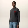Jersey de cuello redondo de lana gris con Ami de Coeur en contraste Jersey de cuello redondo de lana gris con Ami de Coeur en contraste