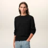 Jersey de cuello redondo de lana negra con Ami de Coeur en contraste