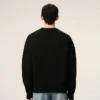 Jersey de cuello redondo de lana negra con Ami de Coeur en contraste Jersey de cuello redondo de lana negra con Ami de Coeur en contraste