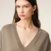 Jerséu de manga corta y cuello en V de lana beige Jerséu de manga corta y cuello en V de lana beige