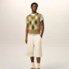 Jerséu sin mangas de lana y algodón marrón con diseño Argyle en intarsia Jerséu sin mangas de lana y algodón marrón con diseño Argyle en intarsia