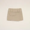 Minifalda cruzada de algodón beige Minifalda cruzada de algodón beige