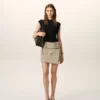 Minifalda cruzada de algodón beige Minifalda cruzada de algodón beige