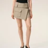 Minifalda cruzada de algodón beige Minifalda cruzada de algodón beige