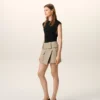 Minifalda cruzada de algodón beige Minifalda cruzada de algodón beige