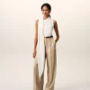 Pantalones anchos de cintura alta de lana nueva en color beige con dos pliegues Pantalones anchos de cintura alta de lana nueva en color beige con dos pliegues