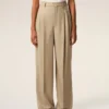 Pantalones anchos de cintura alta de lana nueva en color beige con dos pliegues Pantalones anchos de cintura alta de lana nueva en color beige con dos pliegues