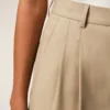 Pantalones anchos de cintura alta de lana nueva en color beige con dos pliegues Pantalones anchos de cintura alta de lana nueva en color beige con dos pliegues