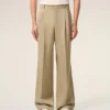 Pantalones anchos de cintura baja de lana nueva en color beige