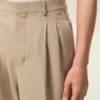 Pantalones anchos de cintura baja de lana nueva en color beige