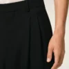 Pantalones anchos de cintura baja de lana virgen negra