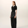 Pantalones con cinturón de satén negro con hebilla Pantalones con cinturón de satén negro con hebilla