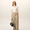 Pantalones con cinturón envuelto de algodón beige Pantalones con cinturón envuelto de algodón beige