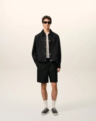 Pantalones cortos Ami de Coeur de nailon negro con cintura elástica y tachuelas