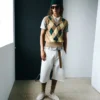 Jerséu sin mangas de lana y algodón marrón con diseño Argyle en intarsia Jerséu sin mangas de lana y algodón marrón con diseño Argyle en intarsia