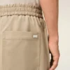 Pantalones de algodón beige con cintura elástica